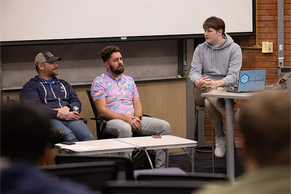 DSU faculty at an AI presentation